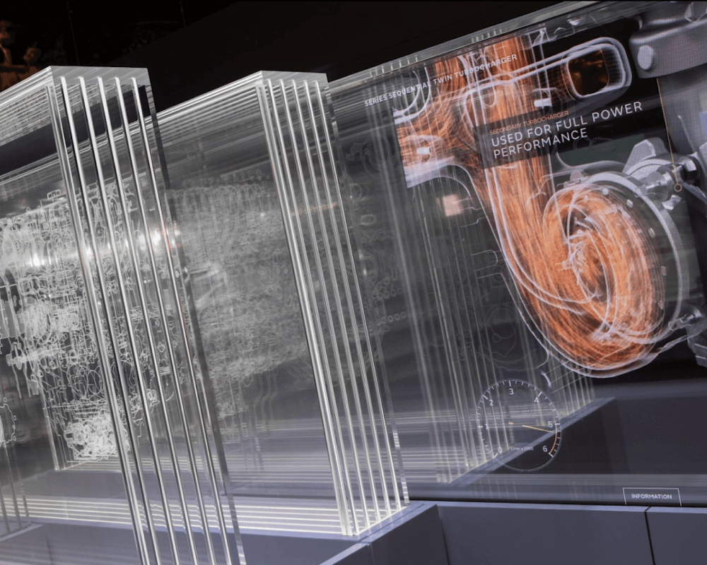 Glass panels with engine design schematic